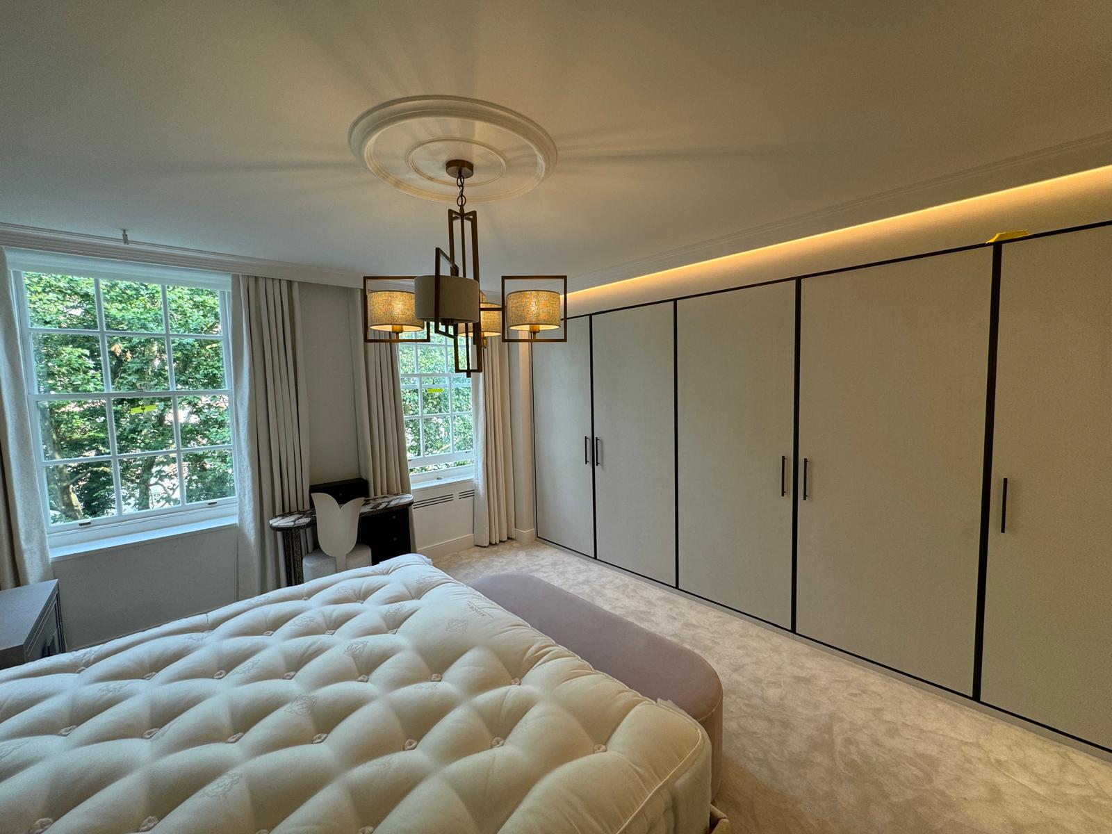 New Level full-height fitted bedroom wardrobes
